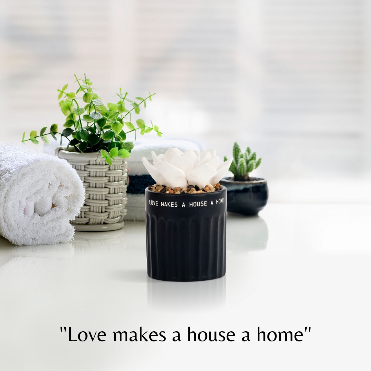 Succulent Oil Diffuser - Home by Demdaco  ''Love makes a house a home''  Our individually crafted succulent ceramic pots give the ability to create a quiet, peaceful aroma anywhere. Place a few drops of your favourite scented oil into the white sculpted succulent top for slow, relaxing oil diffusion. ''Love makes a house a home'' will make anyone feel calm.