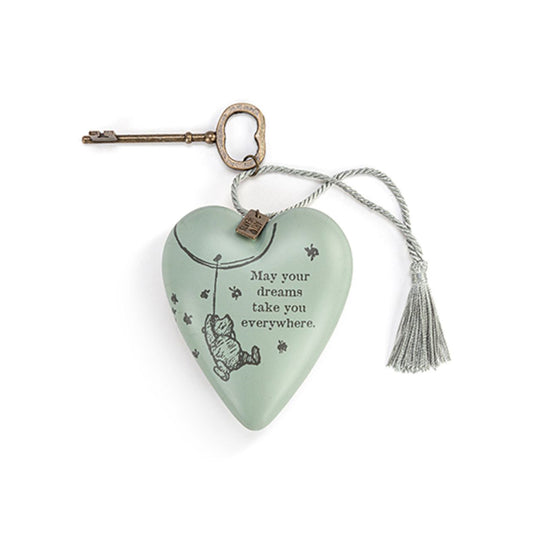 The Demdaco Winnie the Pooh Dreams Art Heart features a charming illustration of the beloved bear with an uplifting message, making it an ideal gift to inspire friends and loved ones to follow their dreams.