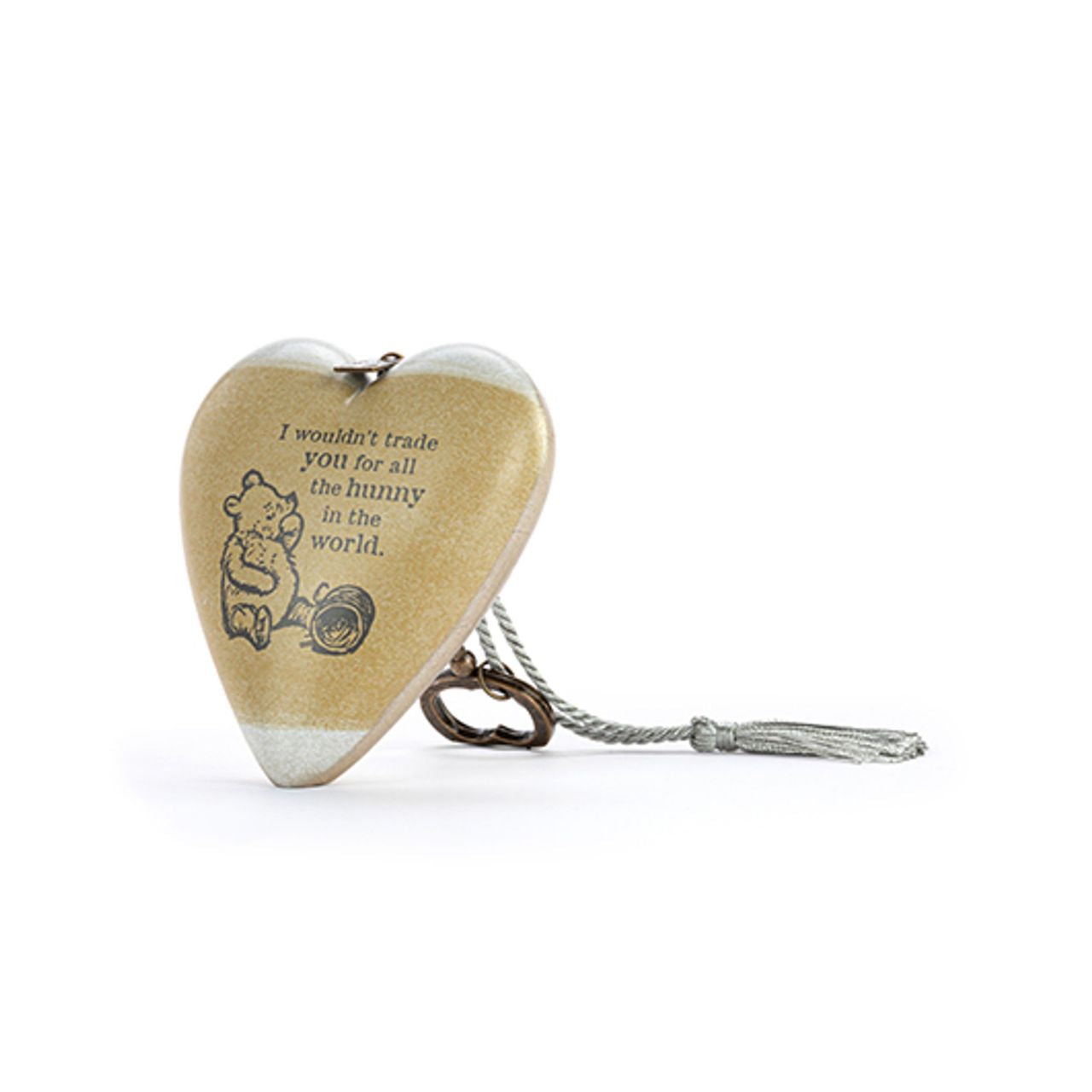 This heart-shaped ornament features a vintage-style illustration of Winnie the Pooh and the quote "I wouldn't trade you for all the bunnies in the world." Suspended from a metal key, it's a lovely gift to show someone special how much they mean to you.