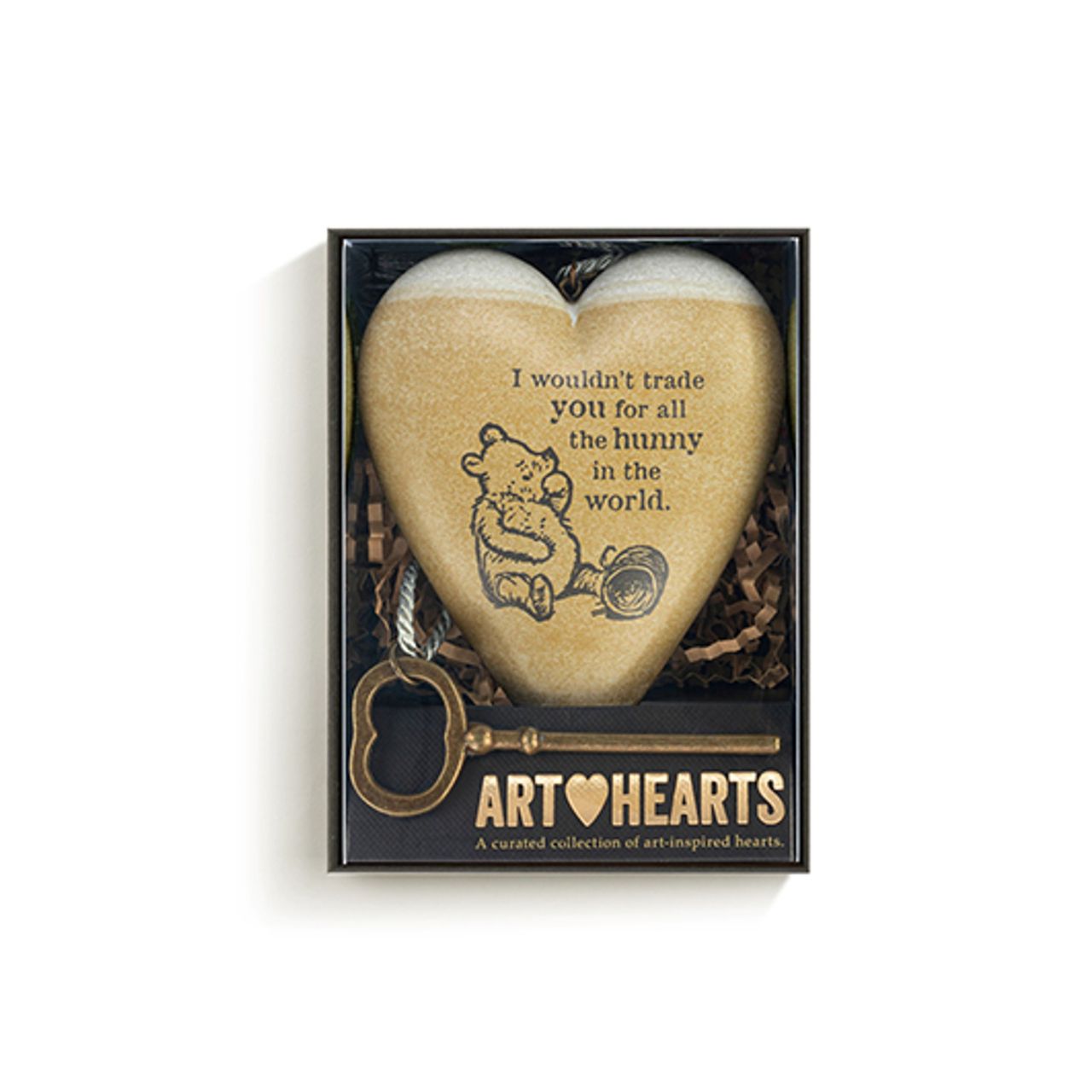 This heart-shaped ornament features a vintage-style illustration of Winnie the Pooh and the quote "I wouldn't trade you for all the bunnies in the world." Suspended from a metal key, it's a lovely gift to show someone special how much they mean to you.