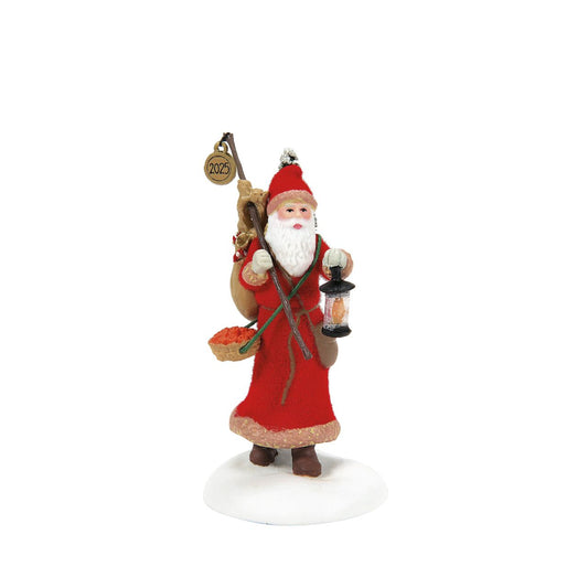 Victorian England comes alive with this enchanting Department 56 Santa figurine from the Dickens' Village Series.