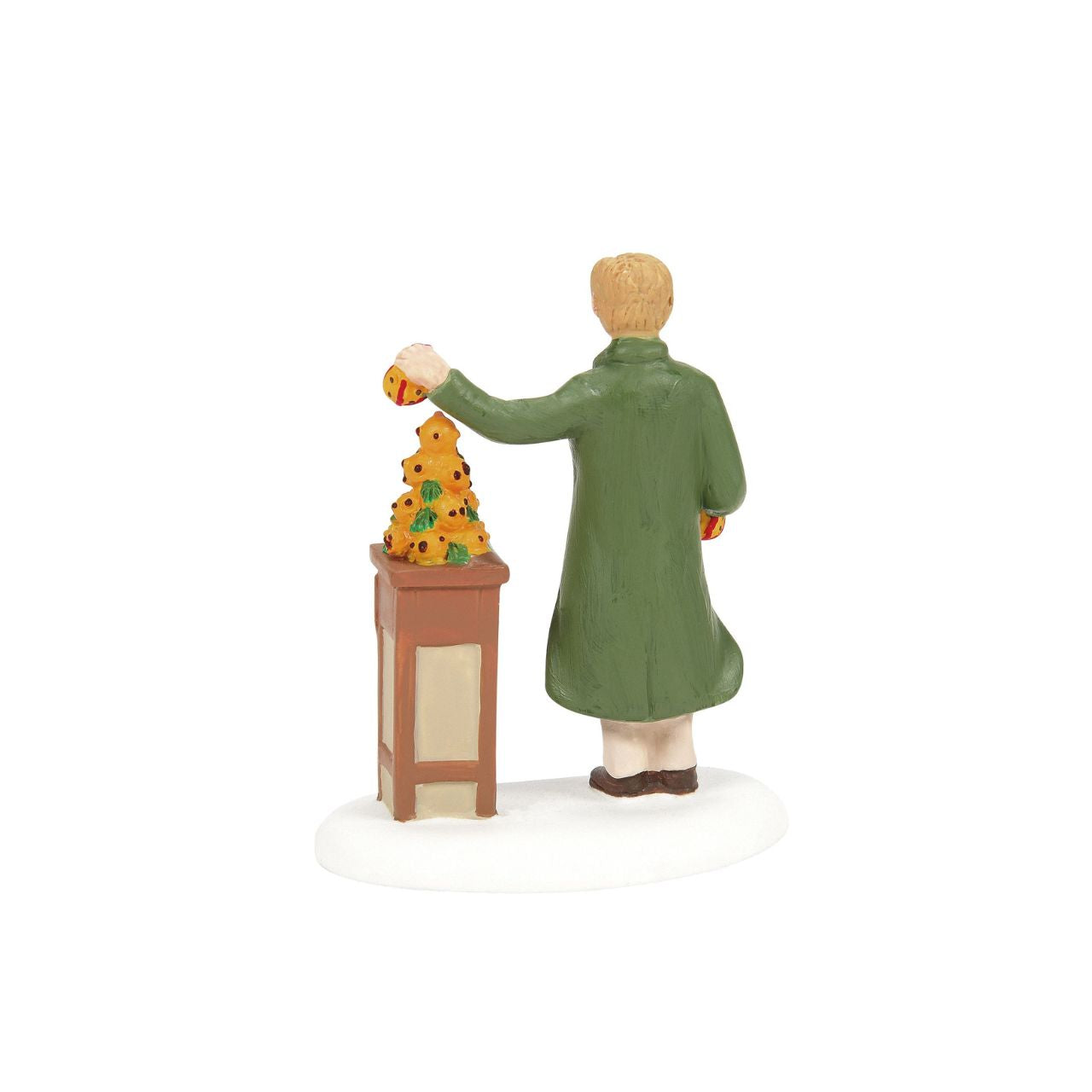 The fruit vender also sells pomanders, oranges stuffed with whole cloves and when dried are used to scent a drawer or closet. Part of the Dickens Market.
