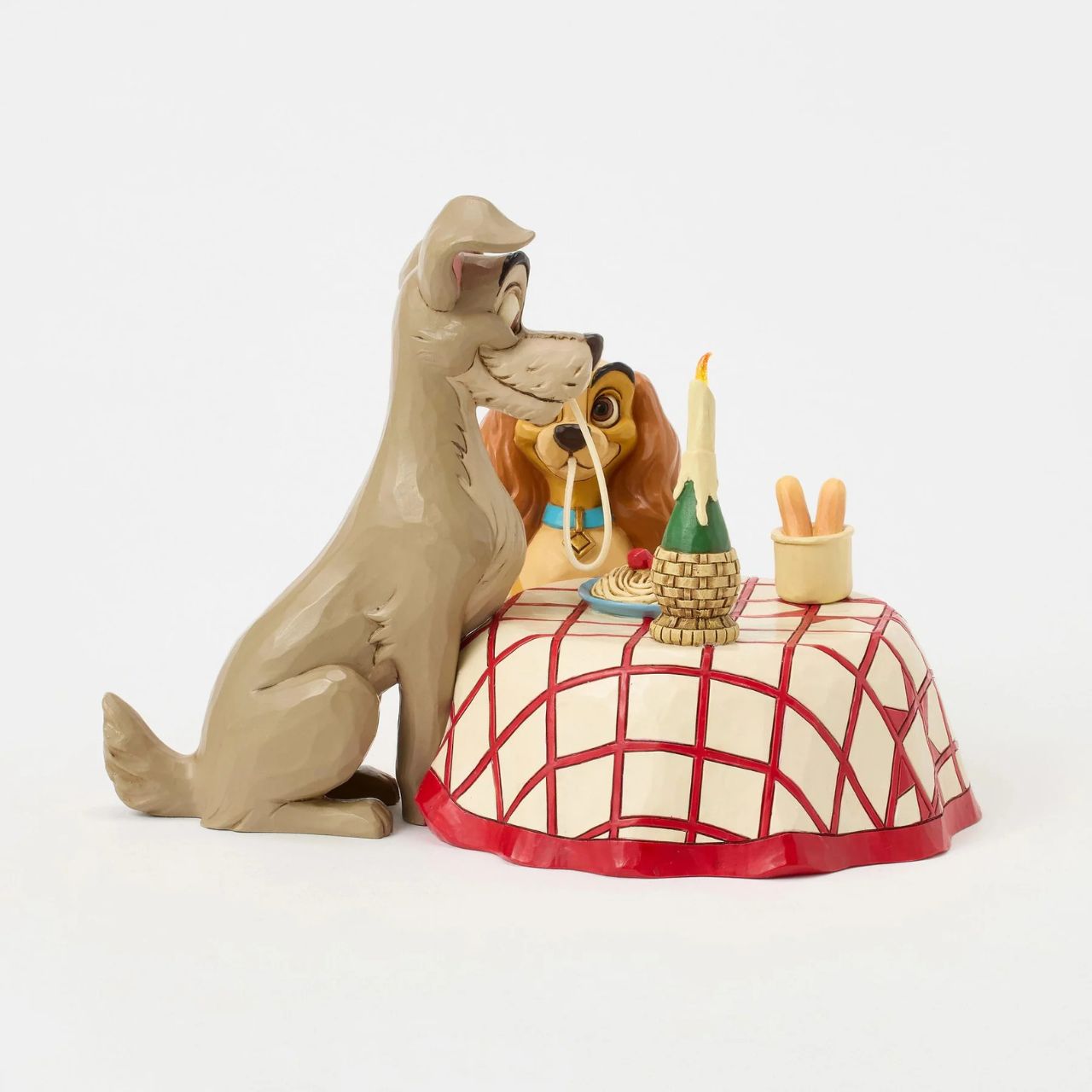 This delightful Jim Shore design celebrates the 70th anniversary of Lady and the Tramp, depicting the pair sharing a table and a plate of pasta, they playfully chew the same noodle. Relive the romance and nostalgia of this timeless love story. Uses 3x AAA batteries (not included) and has an automatic timer, 6 hours on, 18 hours off.