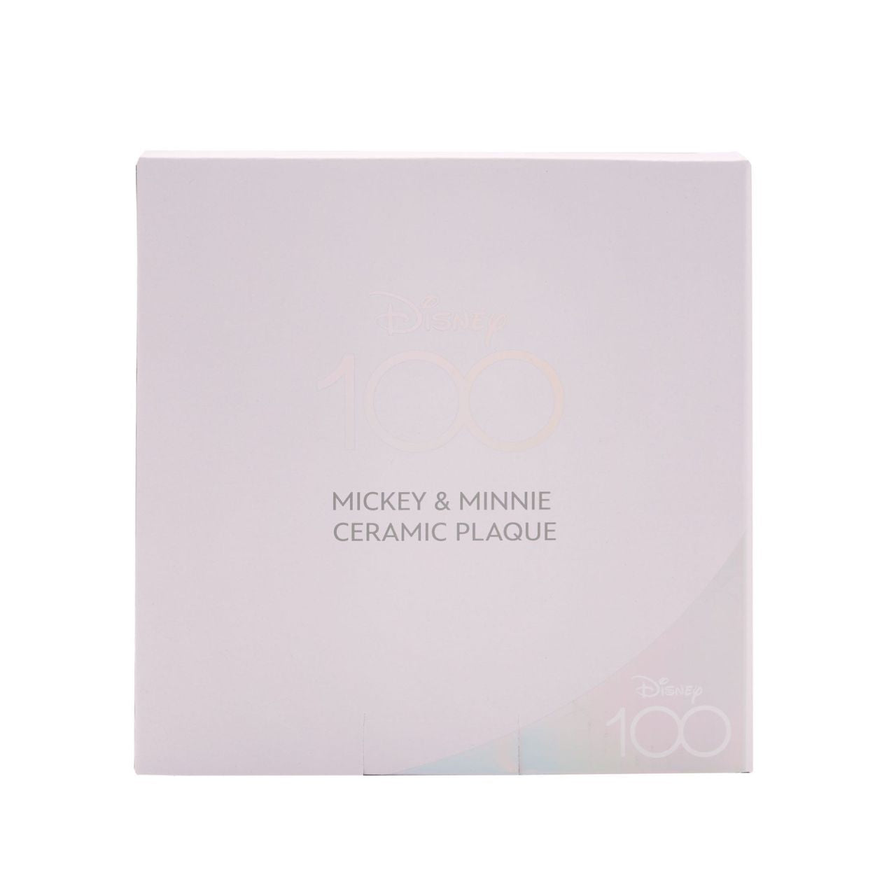 The white, ceramic plaque showcases a scalloped design, complete with printed pencil sketch illustration of Mickey &amp; Minnie Mouse, and ‘Happiness Is a State of Mind’ title. It is displayed using its silver ribbon handle, complete with ‘Disney 100’ silver metal charm.