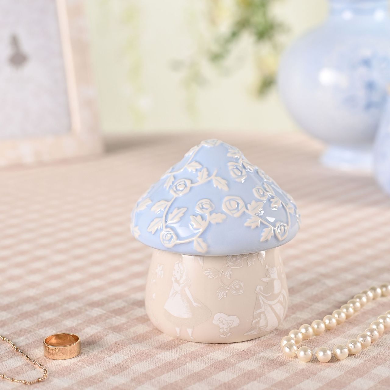 A Disney Alice in Wonderland Mushroom Trinket Box, an officially licensed product that is tailor-made for superfans.