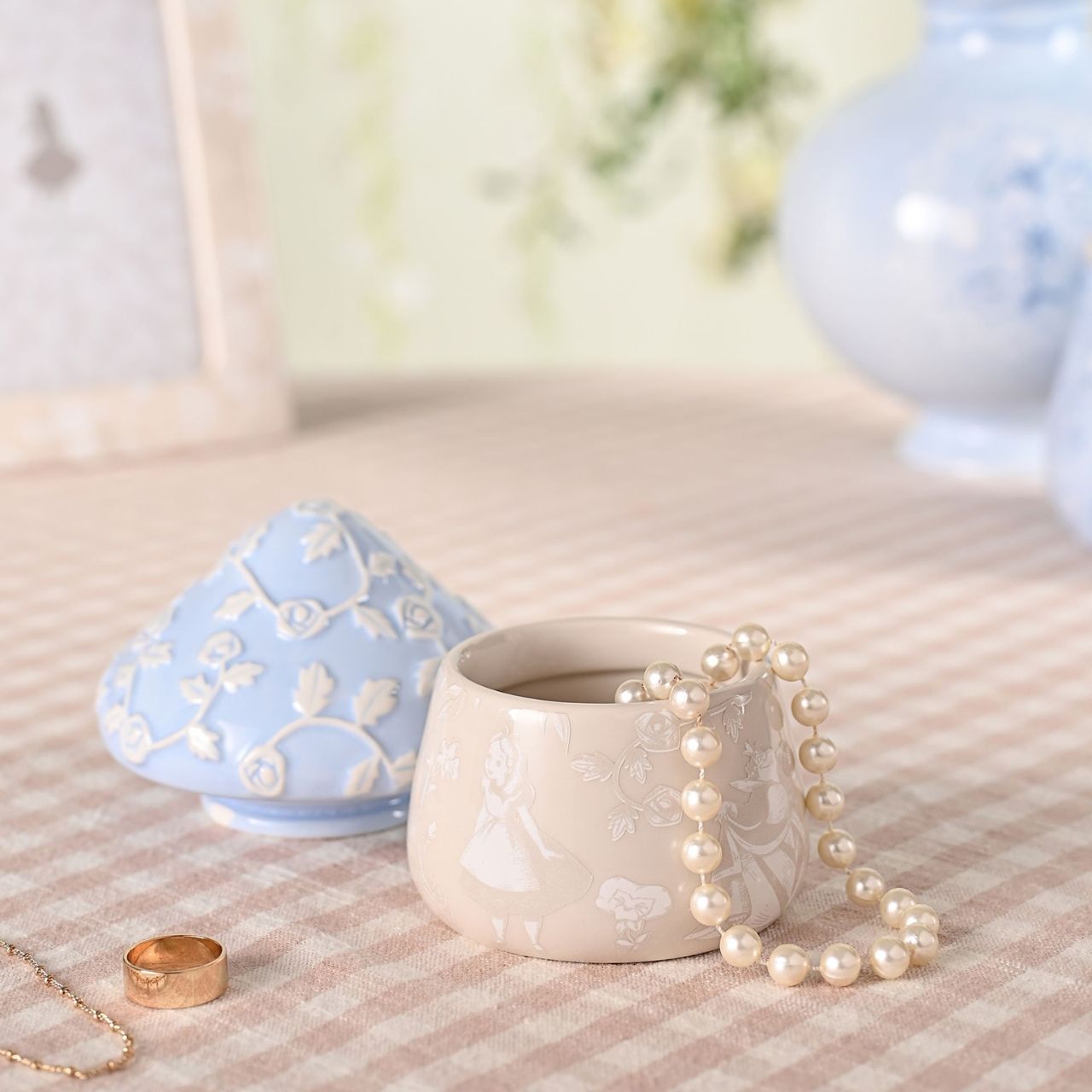 A Disney Alice in Wonderland Mushroom Trinket Box, an officially licensed product that is tailor-made for superfans.