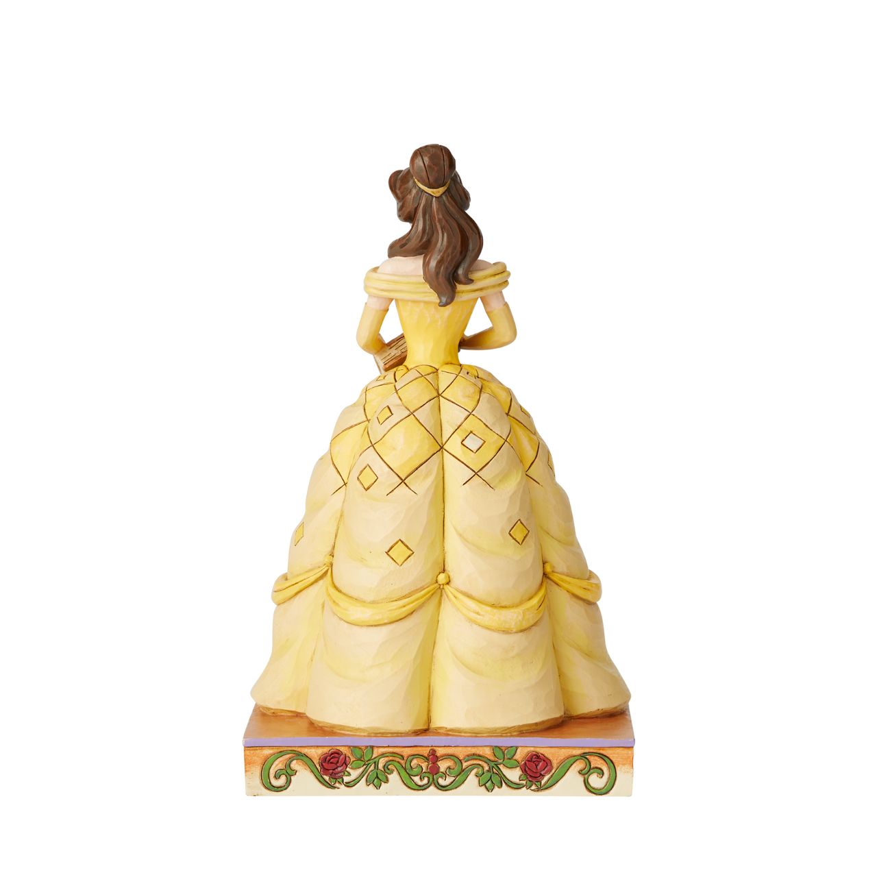 Disney Traditions Book-Smart Beauty Belle Princess Passion  Belle always has her nose in a book, filling her imagination with adventure. The book-smart beauty begins her own timeless tale when she meets the Beast. In this lovely Jim Shore design, Belle wears her classic yellow gown and holds a book in her hands.