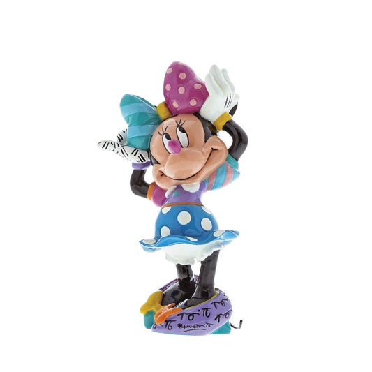 Minnie Mouse is feeling very pretty in her colourful bow and polka dot dress in this fun design by Romero Britto. Set her on your desk, dresser, or nightstand for a quick burst of joy. The cast stone figurine has a high-gloss shiny finish and is presented in a branded gift box.