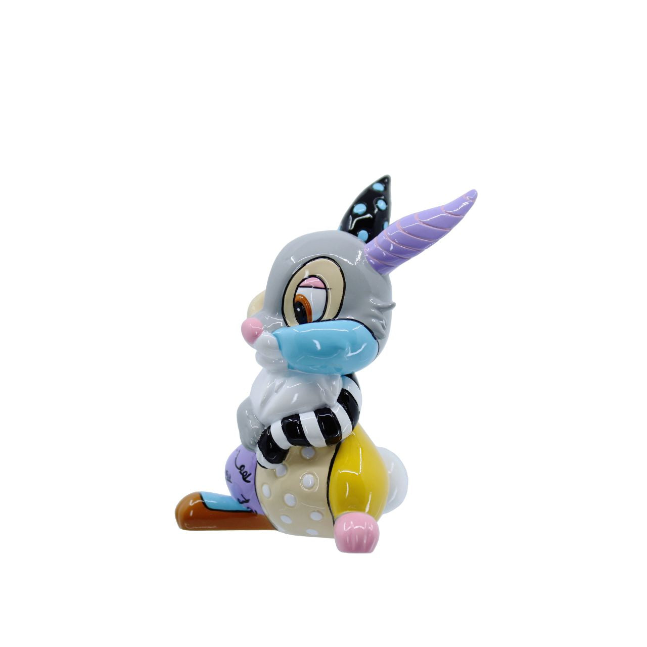 A vibrant tribute to Disney's beloved Bambi character, thumper. Hand-painted with Britto's iconic pop art motifs, this charming collectible breathes new life into the playful, heartwarming rabbit.