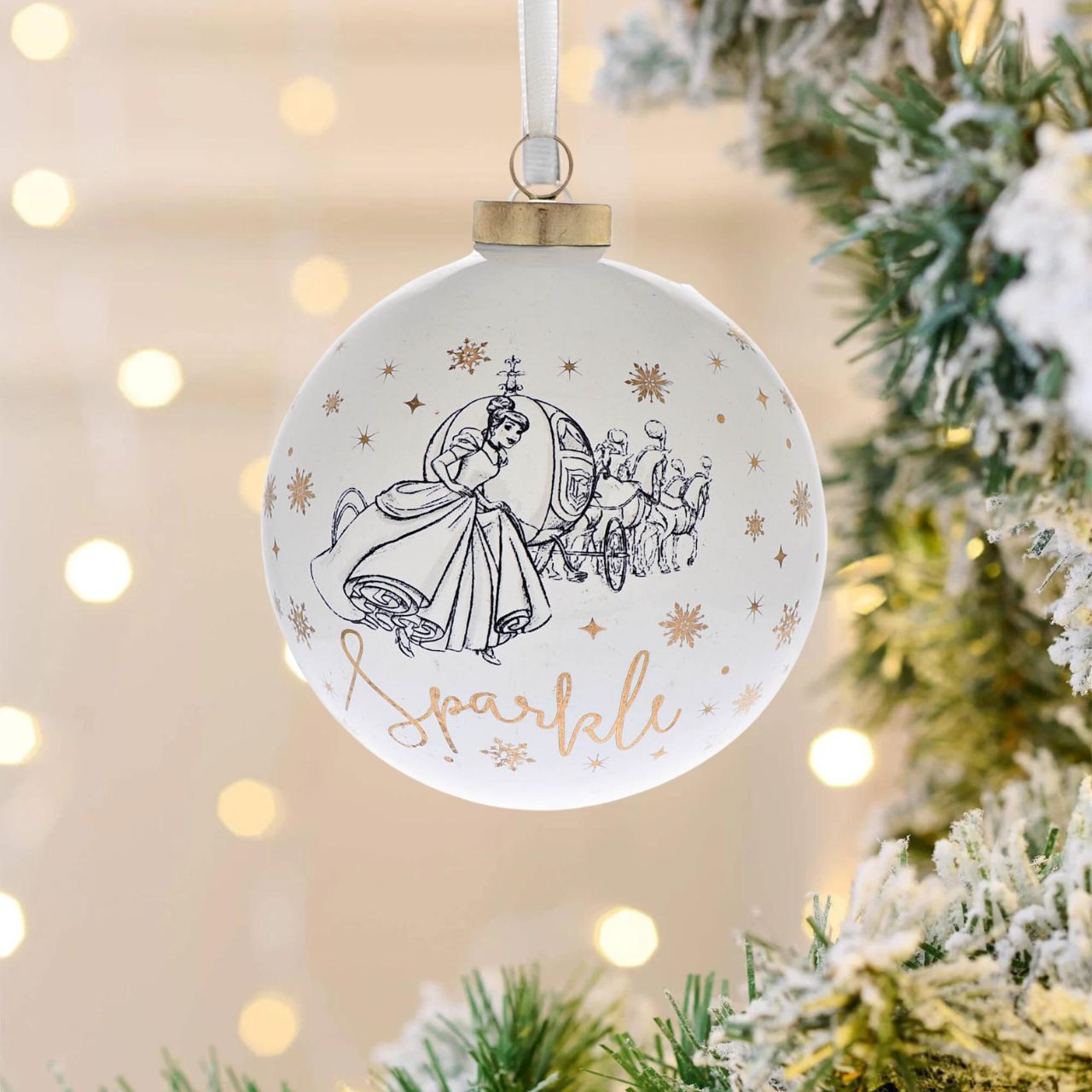 Disney Ceramic Christmas Bauble Cinderella  Bring touch of timeless Disney magic to the Christmas tree with this elegant gold foiled ceramic collectable Cinderella bauble. From Disney Classic Collectables - luxurious collectable gifts for the enduring Disney fan.