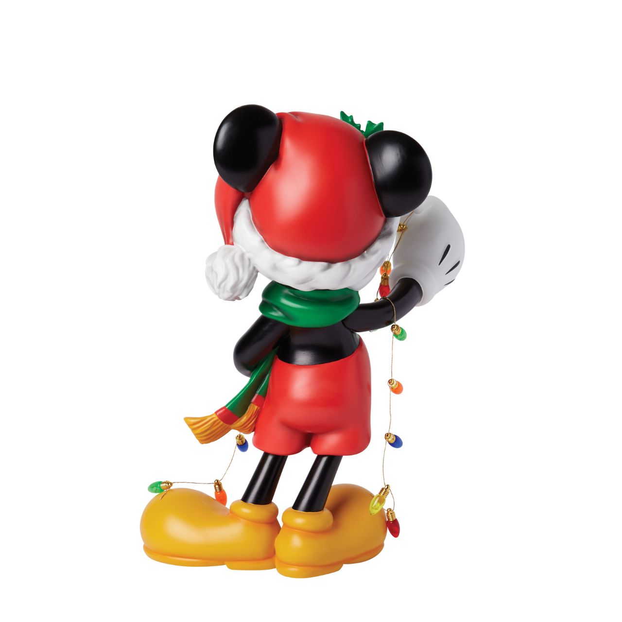 The Holiday Mickey Figurine by Disney Showcase is a fantastic gift for lovers of Disney's iconic mouse. Standing over 30cm tall and dressed in his festive outfit whilst holding a string of Christmas lights, this Mickey figurine is a delightful display piece that will be admired by all those who see it. 
