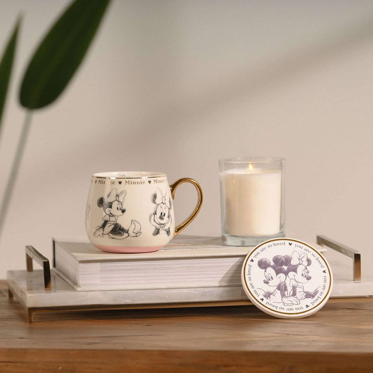 Bring the magic of Disney into the home with the Disney Classic Collectable Coaster, featuring Mickey and Minnie Mouse in a tender embrace.