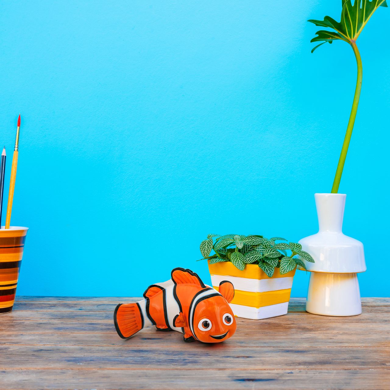 Sharkbait Finding Nemo Money Bank  Featured here is the energetic young clownfish, Sharkbait trying to get back home to the reef and his dad. Save all your pennies is this beautifully sculpted Finding Nemo money bank. The perfect gift for any pixar fan.