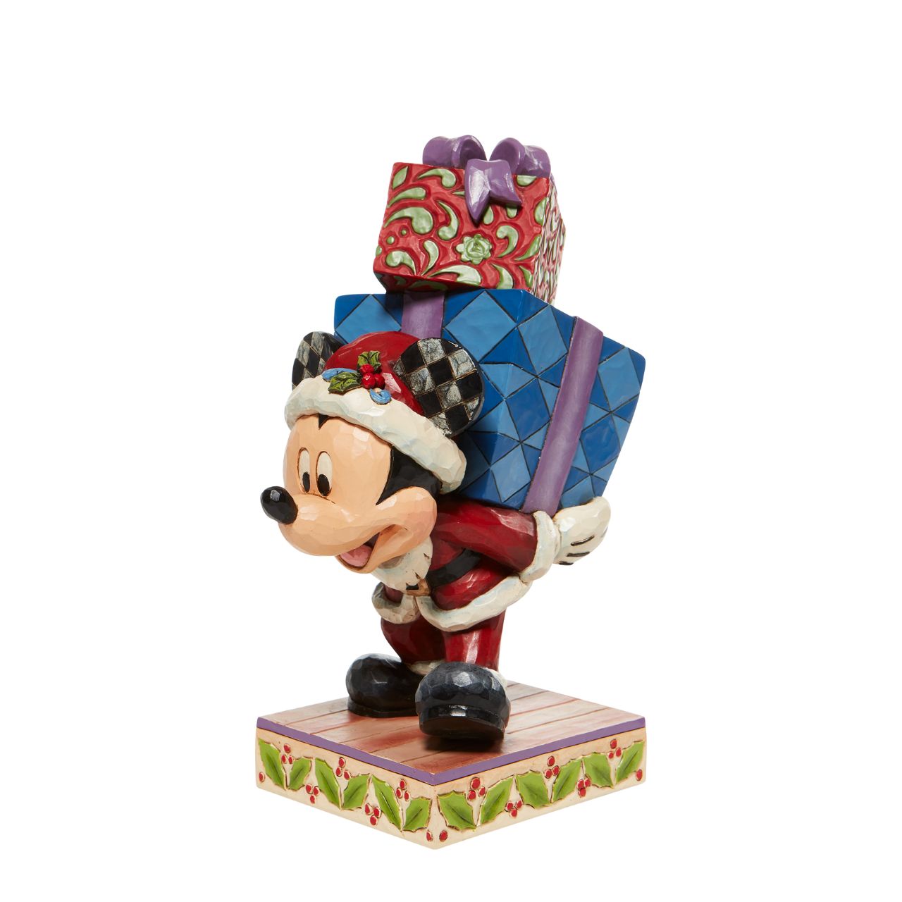 Jim Shore Here Comes Old St. Mick - Disney Mickey Carrying Gifts Figurine  There is a creature stirring in the house - and it's a mouse Dressed as Santa Claus and carrying a stack of presents, Mickey delivers holiday cheer and jolly jingles wherever he goes. 