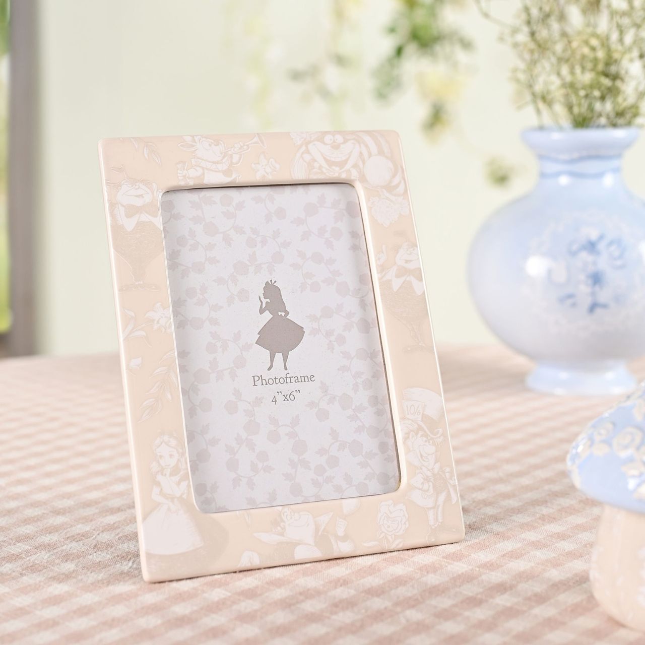 An enchanting Disney Alice in Wonderland Photo Frame, an officially licensed product that is tailor-made for superfans.