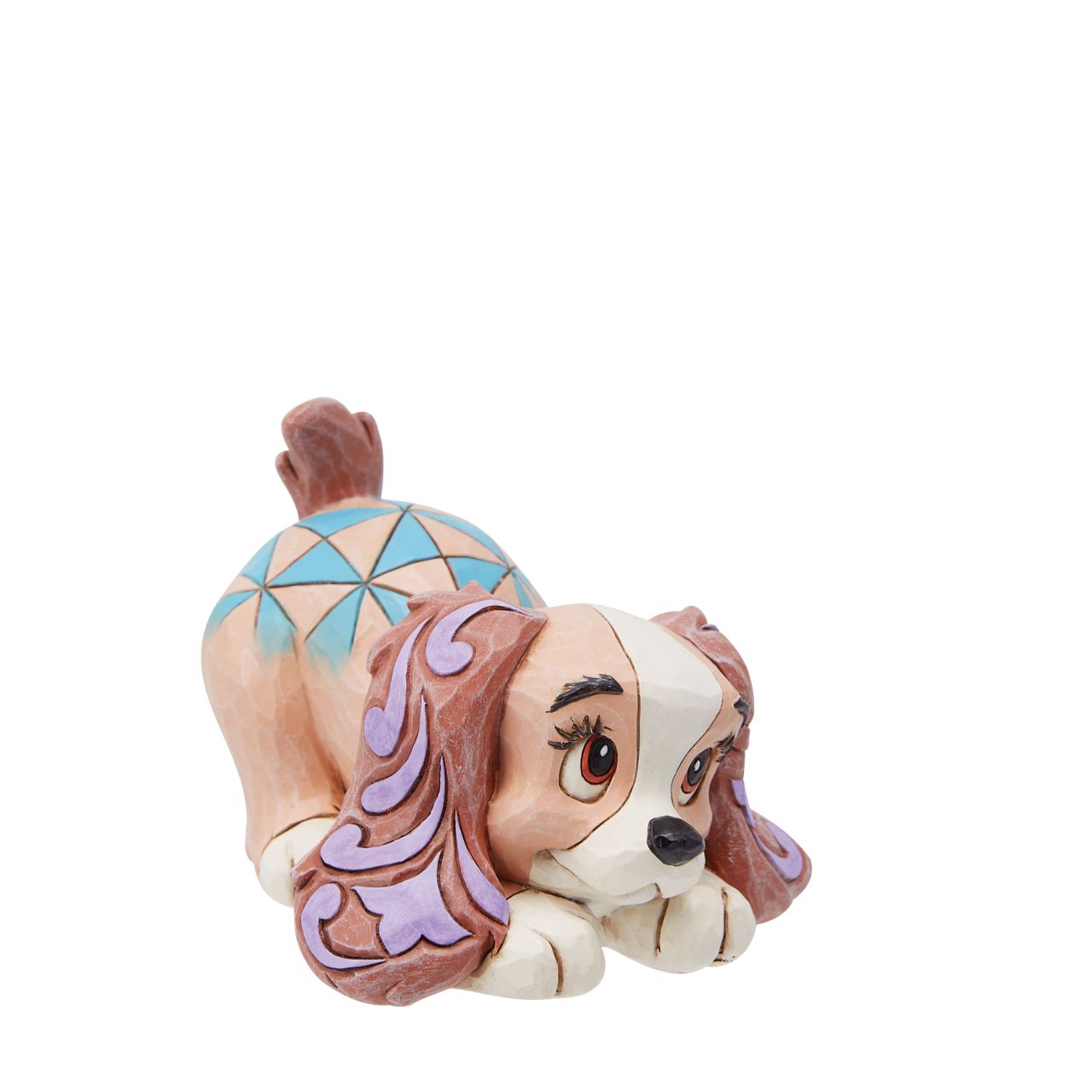 The Disney Traditions collection by Jim Shore brings you an enchanting upgrade of Lady from Lady and the Tramp| This mini animal figurine showcases Lady in a cute and instantly recognizable way, making it an absolutely irresistible addition to your collection.