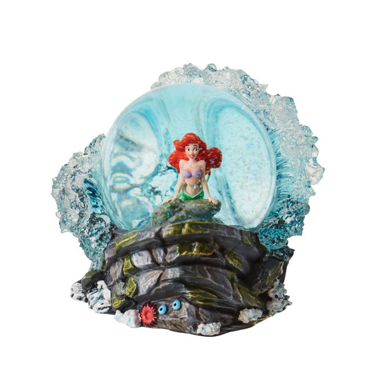 This lovely Little Mermaid waterball from Disney Showcase Collection captures a daydreaming Ariel in stunning hand painted detail. An ornate base with clear resin waves crashing the surface provides us peek both above and under the sea.