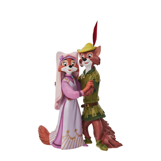 Robin Hood the heroic outlaw is featured here with the beautiful and ladylike Maid Marian in this sweet double figurine. The figurine is made from cast stone. Each piece is hand painted and slight colour variations are to be expected which makes each piece unique.