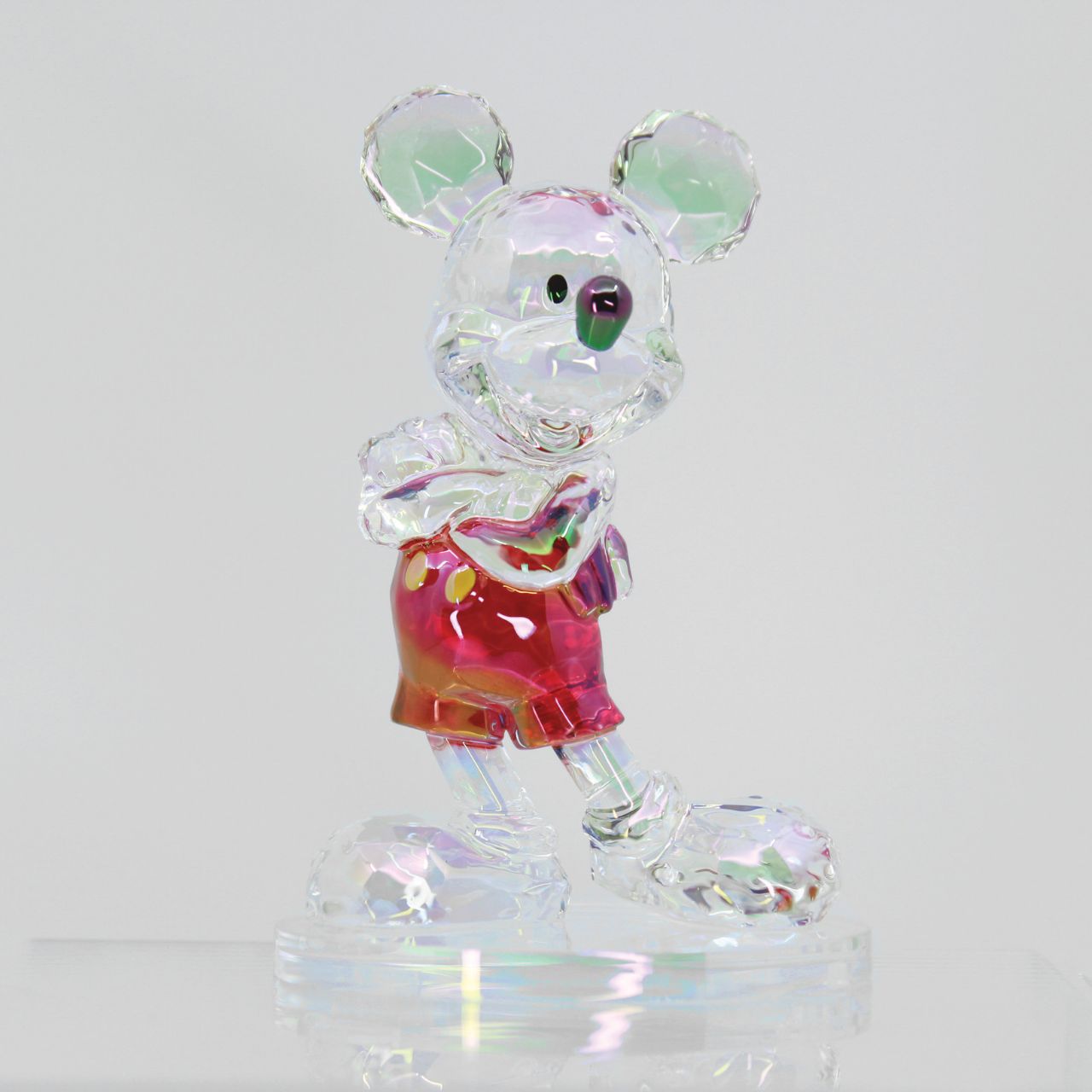 The Disney Facets Collection brings the world's most iconic and beloved characters to life in these "gem cut" acrylic sculptures. With the look of cut crystal at a fraction of the price, this electroplated Mickey Mouse catches the eye with his show-stopping sparkles.