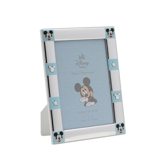 Bring Disney magic home with this charming Mickey Mouse photo frame, perfect for cherished memories. Adorned with Mickey's iconic ears and stars, this silver-plated frame is a must-have for any Disney fan.