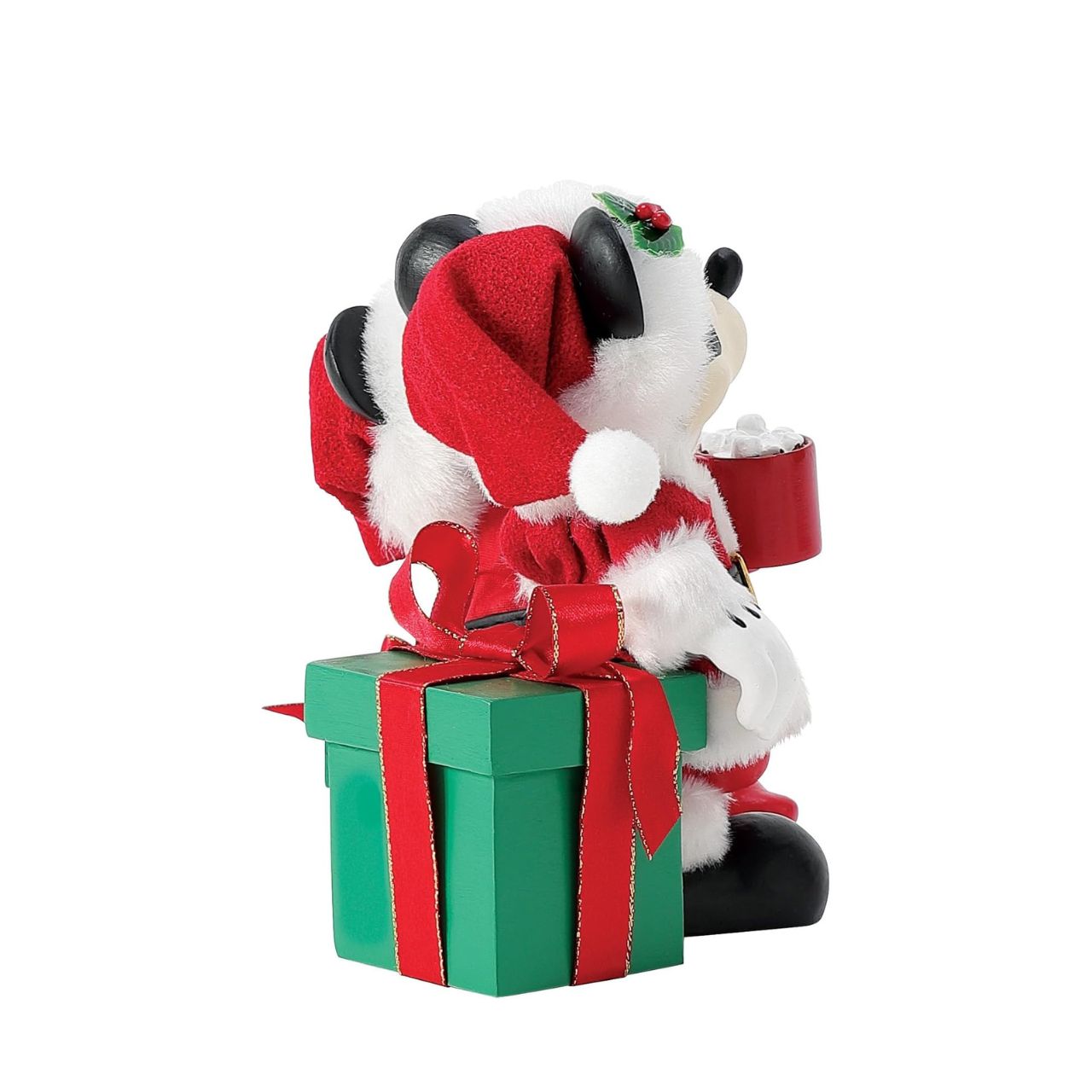 Capture the magic of the season with this charming Department 56 Disney figurine. Mickey and Minnie Mouse are nestled together on festive wrapped gifts, each cradling a steaming mug of hot cocoa—the perfect scene of cosy holiday togetherness.