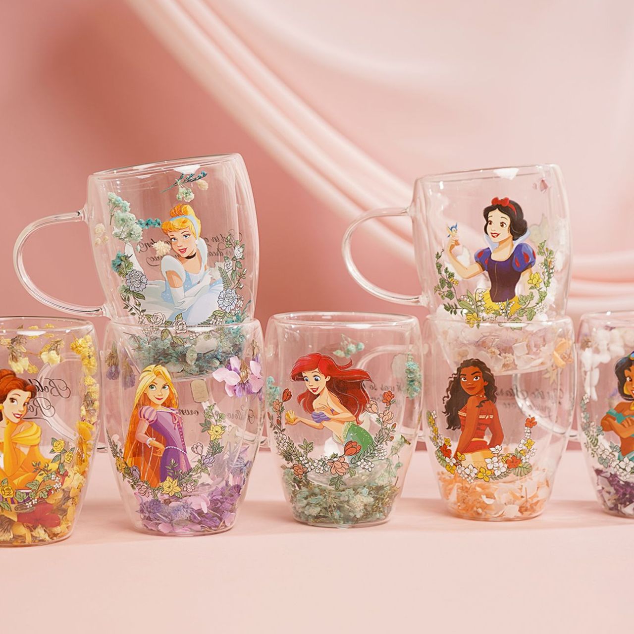 Step into the enchanting world of Disney with the Disney Pastel Princess Glass Mug - Ariel.