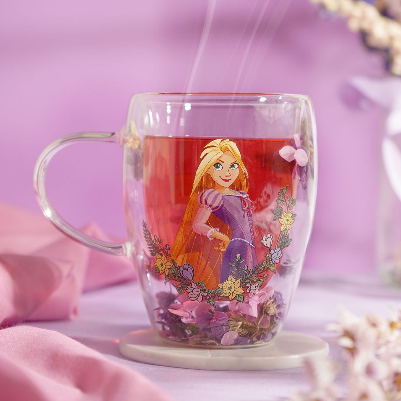 Step into the enchanting world of Disney with the Disney Pastel Princess Glass Mug with Dried Flowers - Rapunzel.