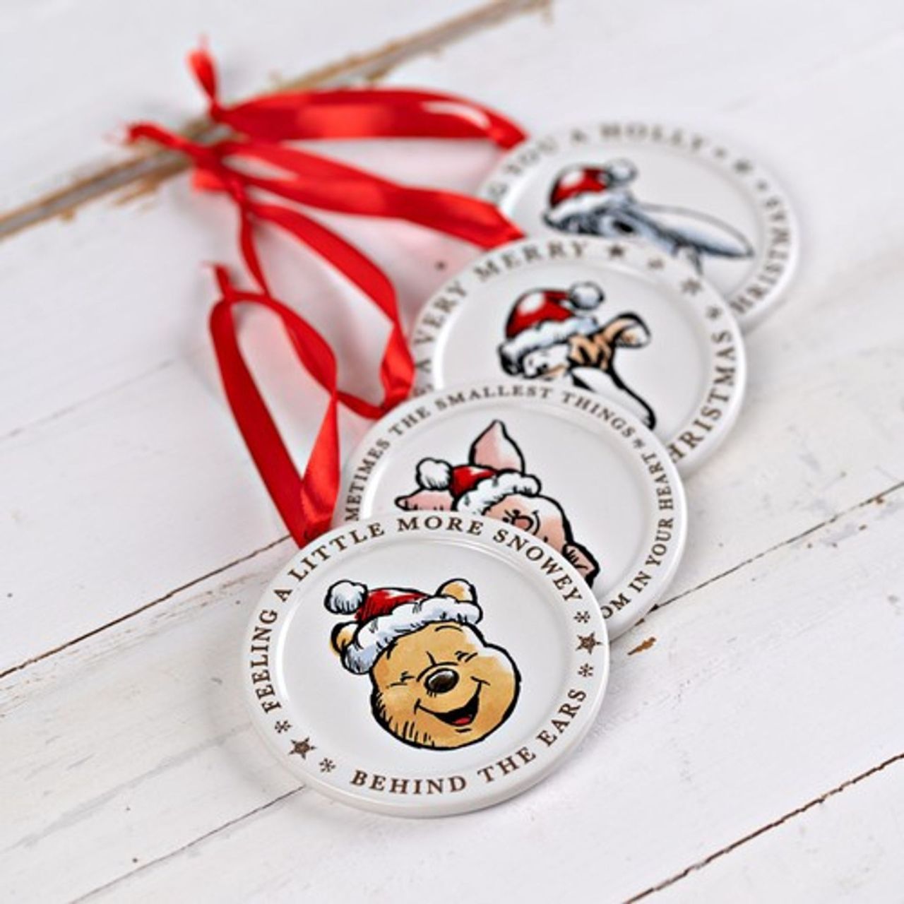 Disney Piglet Christmas Ceramic Decoration  This delightful Christmas decoration is sure to bring some joy to any Disney fan's tree this year. A perfect ornament for a family home, make little one's Christmas a little more special this year with Tigger.
