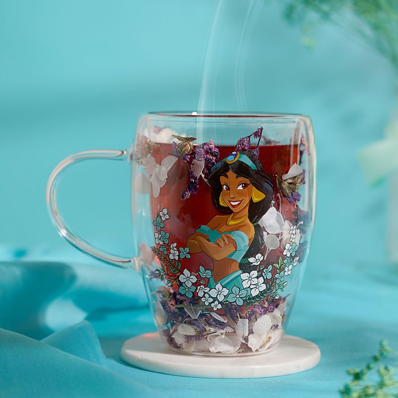 Step into the enchanting world of Disney with the Disney Pastel Princess Glass Mug, featuring Jasmine surrounded by dried flowers.