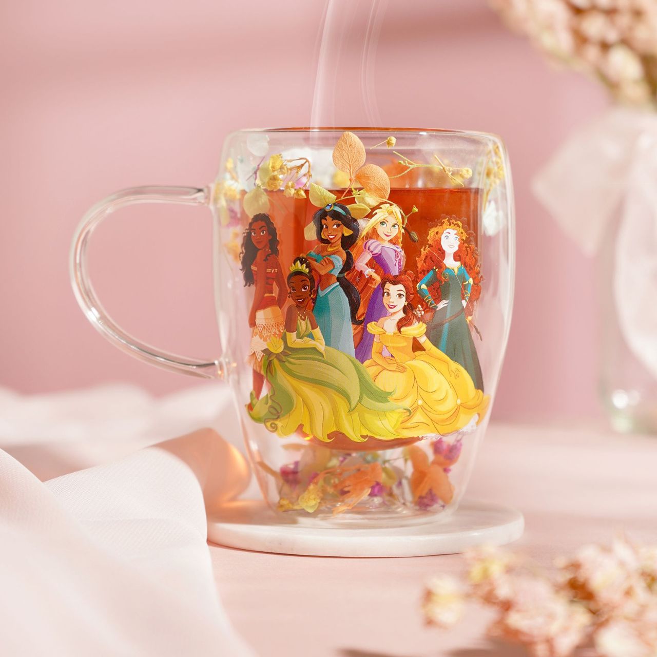 Step into the enchanting world of Disney with the Disney Pastel Princess Glass Mug with Dried Flowers - Multi Princess.