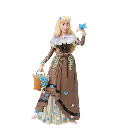 The iconic Disney princess Aurora from Sleeping Beauty is depicted here in her Briar Rose outfit. She has received the botanical treatment with delicate flowers spreading across her dress and spilling out of her basket while a bird perches on her hand.