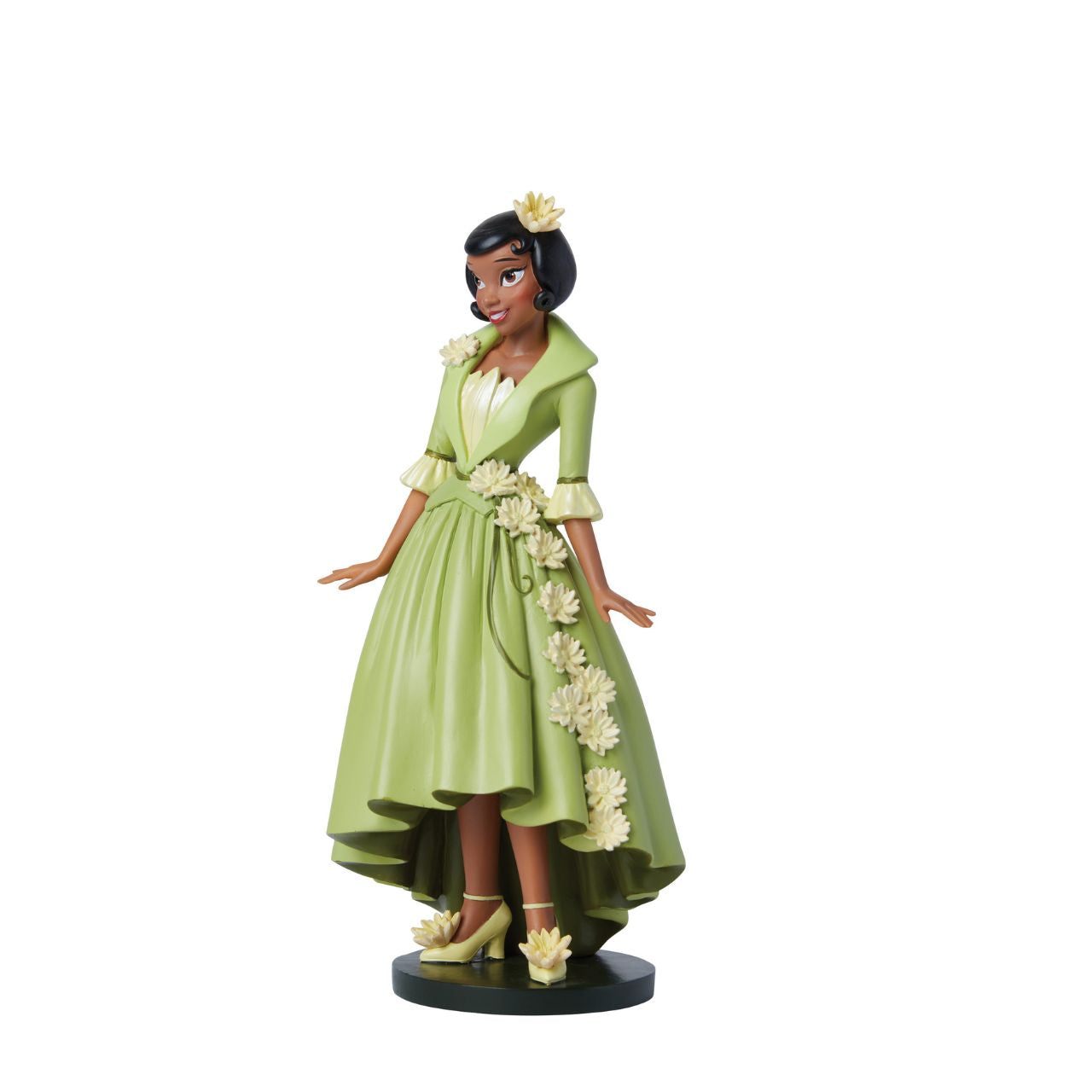 Part of the Disney Showcase Botanical collection, the Botanical Tiana figurine sees Disney's iconic princess from The Princess and the Frog in her iconic green dress adorned with delicate yellow flowers.