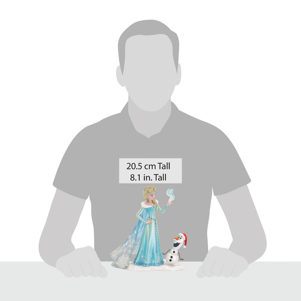 Elsa and Olaf returns to the Disney Showcase Collection with this highly detailed figure featuring superior detailing like opalescent paints, clear resin cape and a glittered snow base.