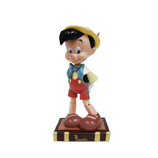 The Pinocchio 85th Anniversary Figurine is more than just a collector's item, it is a celebration of dreams. Masterfully crafted from cast stone to capture the enchanting essence of Gepetto's curious little puppet.