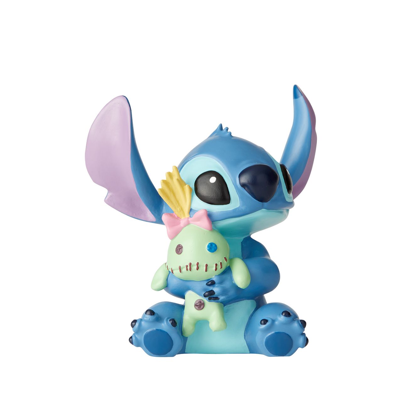 Disney Showcase Stitch Doll Figurine  Irresistibly adorable, this little Stitch will make you want to give your best friend the same tight squeeze he's giving his doll. 'Ohana means family, make him a part of yours.