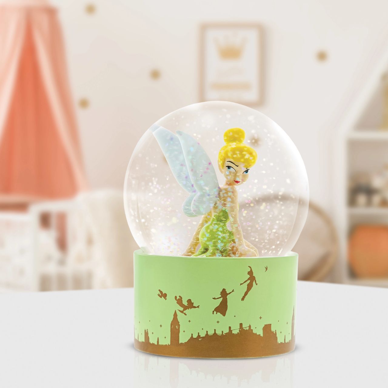 Experience the enchanting world of Disney with our Disney Showcase Collection Fairy Dust Tinker Bell Waterball. This Snow Globe captivates the essence of Tinker Bell's magic, making it the perfect gift for any dreamer. Add a touch of fairy wonder to your home and embrace the enduring magic of Disney.