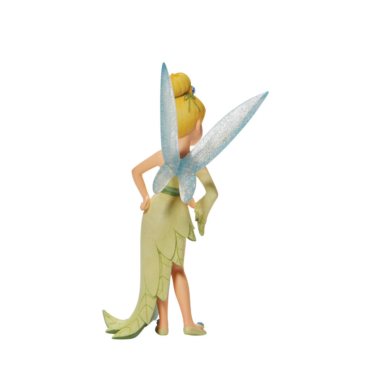 Hands on her hips, this pixie pouts with elegance and charm. With sparkling fairy wings and bedazzled accents, this Disney collectible is a tiny treasure. Wearing a dress made from the finest leaves, Tinker Bell is the unofficial queen of Neverland.