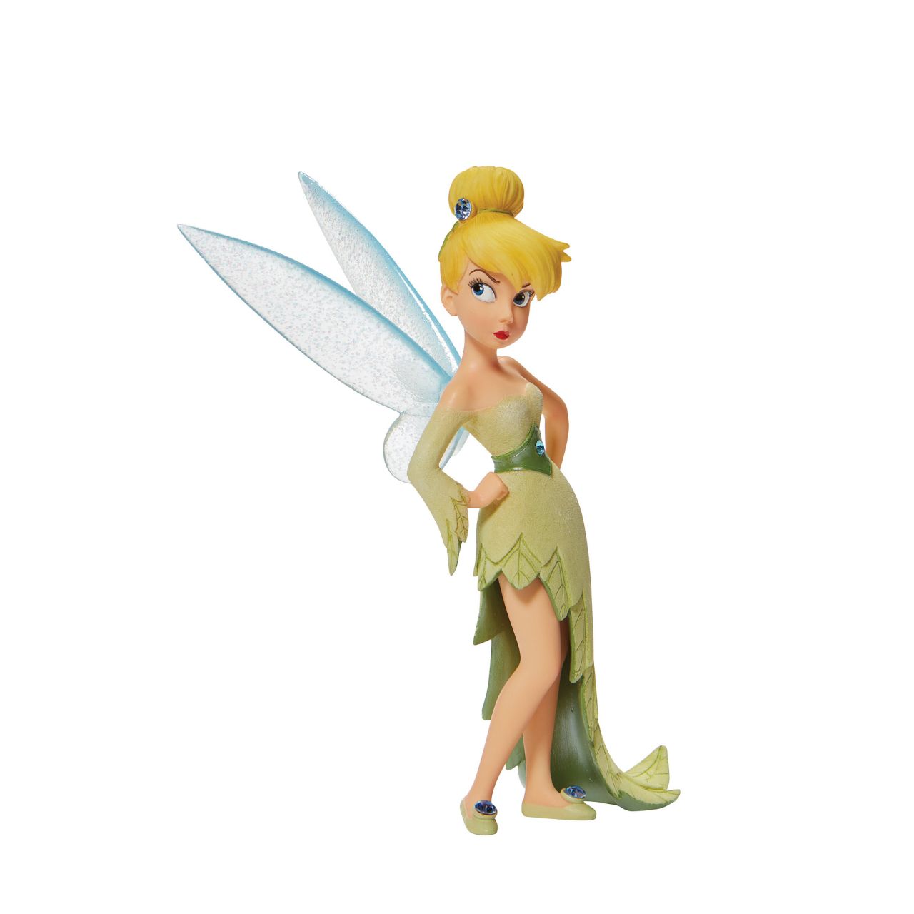 Hands on her hips, this pixie pouts with elegance and charm. With sparkling fairy wings and bedazzled accents, this Disney collectible is a tiny treasure. Wearing a dress made from the finest leaves, Tinker Bell is the unofficial queen of Neverland.