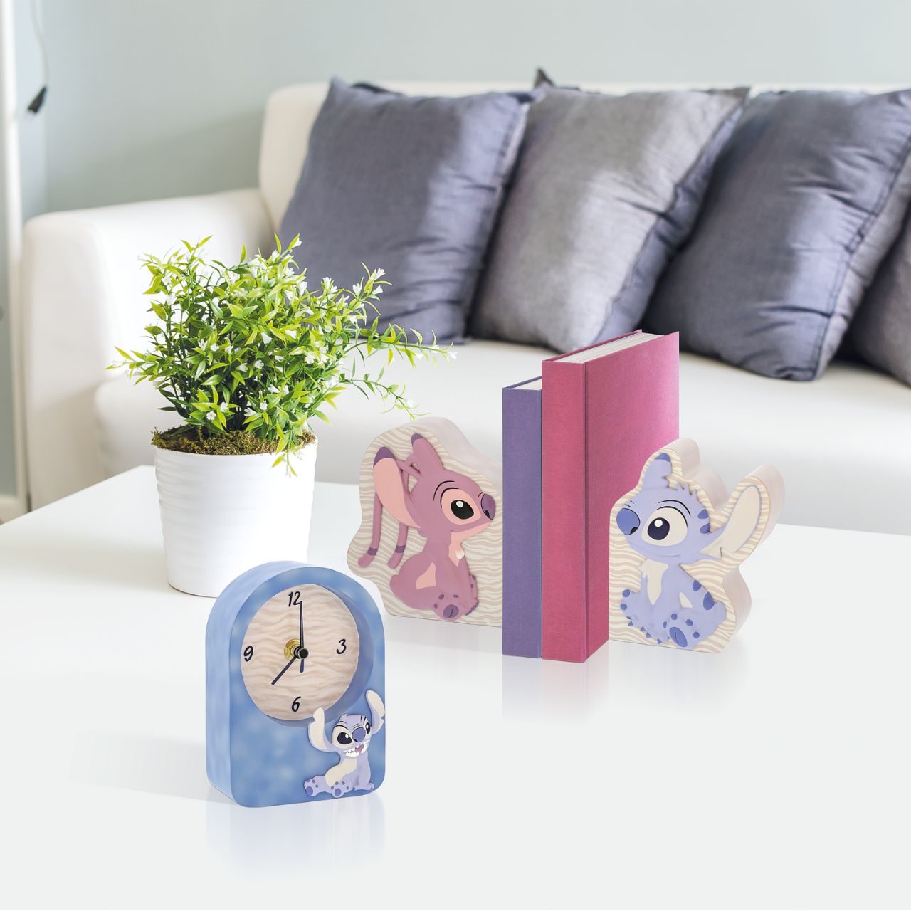 Tick-tock in Disney style. Introducing the Stitch Desk Clock-embossed with Stitch's charm on the front. This adorable timepiece brings playful energy to your workspace. Let Stitch keep you company as you navigate your day, adding a dash of Disney magic to every hour.