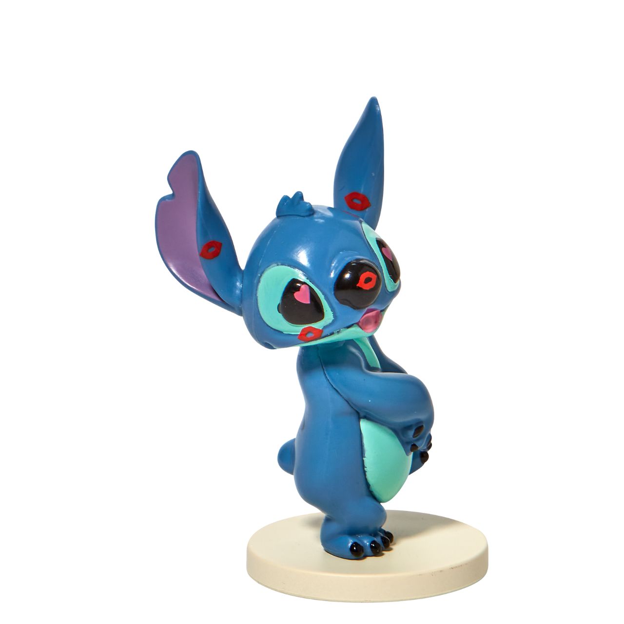 Grand Jester Stitch Covered in Kisses Mini Figurine  This super cute Stitch has been covered in lipstick kisses and looks loved up. He is made from high quality vinyl and is the perfect addition to any Stitch fans collection or bought as a gift for a birthday, Valentines or as a little treat.