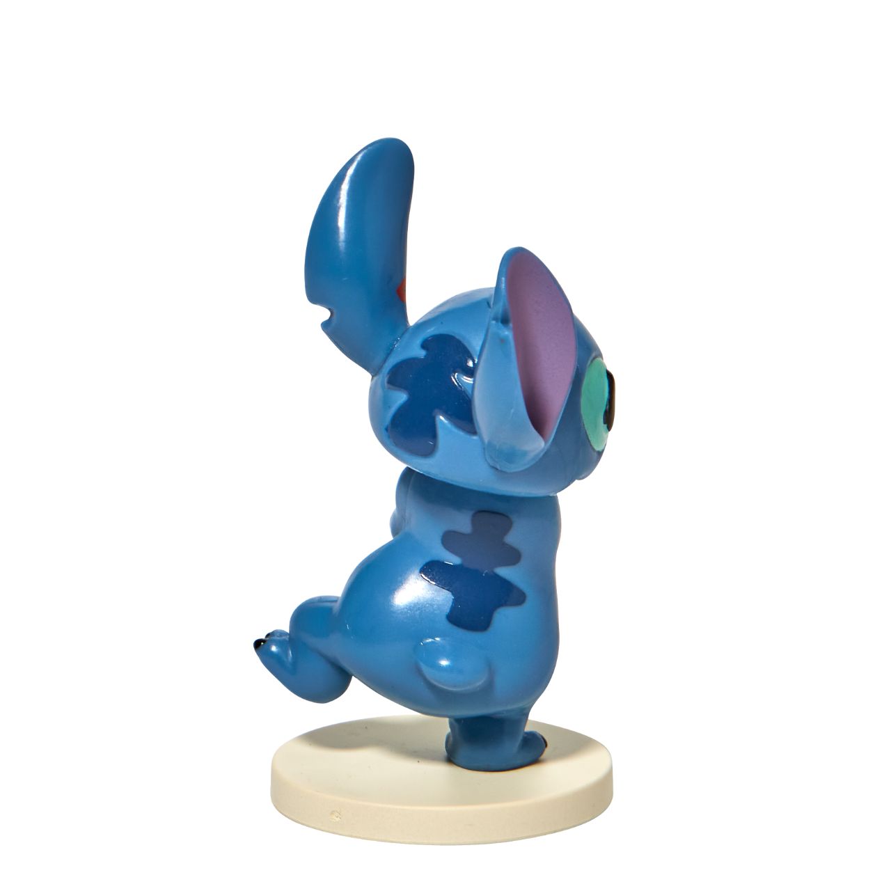 Grand Jester Stitch Covered in Kisses Mini Figurine  This super cute Stitch has been covered in lipstick kisses and looks loved up. He is made from high quality vinyl and is the perfect addition to any Stitch fans collection or bought as a gift for a birthday, Valentines or as a little treat.