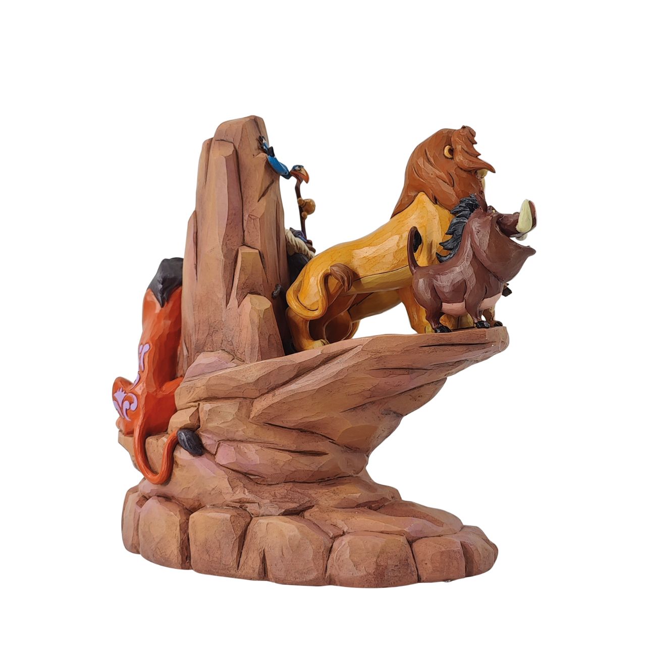This incredible creation by Jim Shore celebrates the 30th anniversary of Disney's beloved 1994 film, The Lion King. With patchwork patterning and Rafiki's Simba drawing, Pride Rock looks stately as the main characters stand upon the stage.