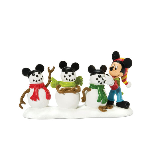 This hand-painted resin accessory is classic Mickey – dressed in a striped stocking cap and neck scarf, Mickey is putting the final touches on his three snowmen. Instead of a tall silk hat each snowman dons the iconic Mickey's Ears hat.