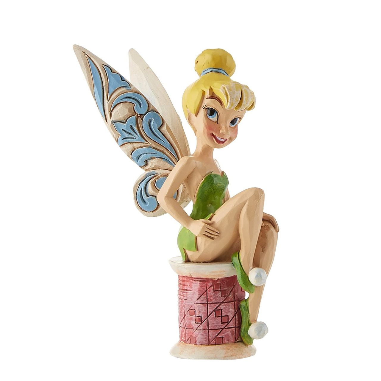 Disney Tinker Bell Crafty Tink Figurine  Tinker Bell takes a rest on a tiny spool of thread. Great for Tink lovers, Jim Shore collectors and sewing enthusiasts alike. A fun and flirty new personality pose from award winning artist and sculptor, Jim Shore.