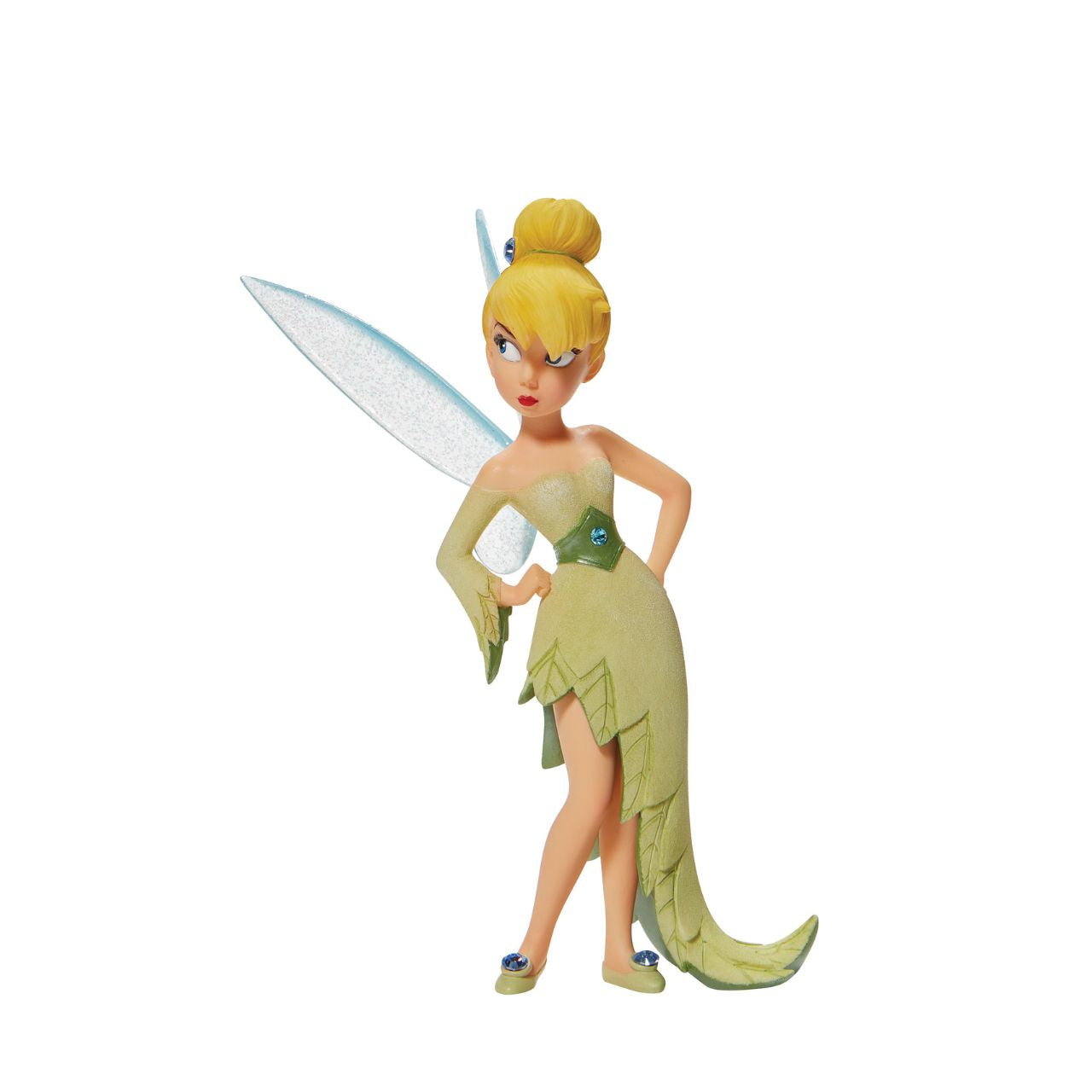 Hands on her hips, this pixie pouts with elegance and charm. With sparkling fairy wings and bedazzled accents, this Disney collectible is a tiny treasure. Wearing a dress made from the finest leaves, Tinker Bell is the unofficial queen of Neverland.