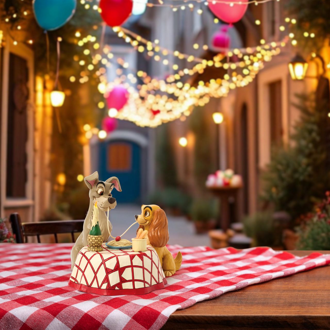 This delightful Jim Shore design celebrates the 70th anniversary of Lady and the Tramp, depicting the pair sharing a table and a plate of pasta, they playfully chew the same noodle. Relive the romance and nostalgia of this timeless love story.