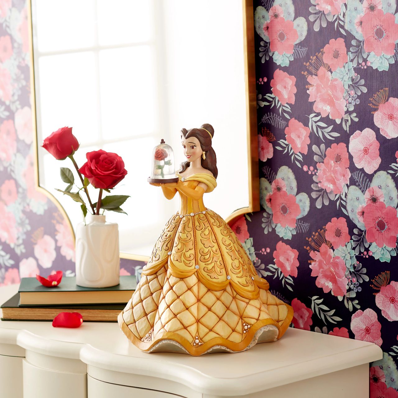 First in a Series of Deluxe figurines (The Enchanted Princess Series.) Designed by Jim Shore in celebration of Beauty and the Beast's 30th Anniversary is this striking 38.0cm Belle figurine, Belle looks stunning in her characteristic golden ball gown, embellished with pearls and swarovski crystals.