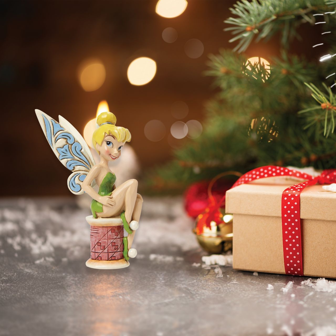 Tinker Bell takes a rest on a tiny spool of thread. Great for Tink lovers, Jim Shore collectors and sewing enthusiasts alike. A fun and flirty new personality pose from award winning artist and sculptor, Jim Shore.