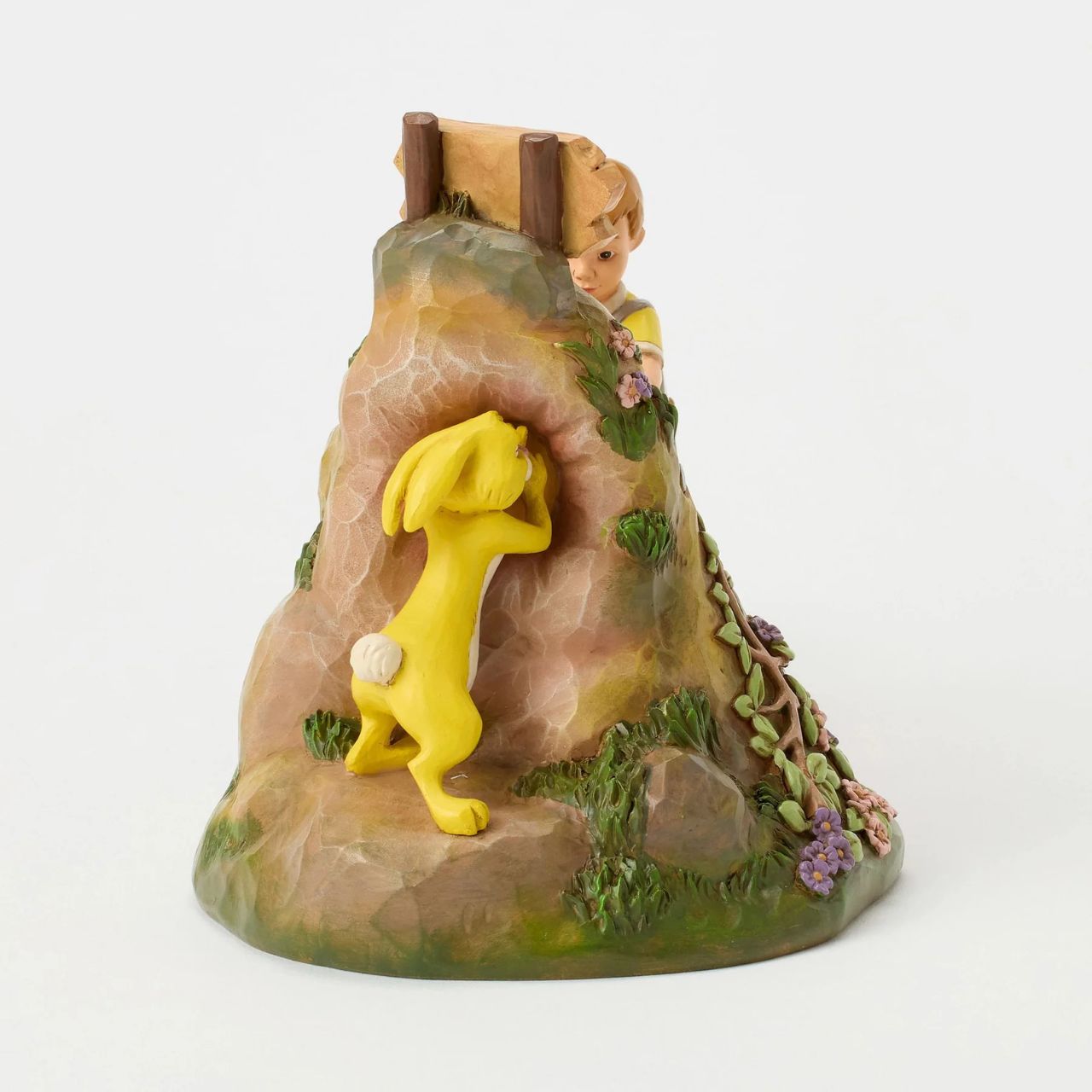 After a celebration in the Hundred Acre Wood, Pooh needs a little help exiting Rabbit's House. Christopher Robin, Kanga, and Eeyore pull Pooh's hands while Rabbit pushes from behind. Adorned with Jim Shore's iconic detailing and soft floral accents.