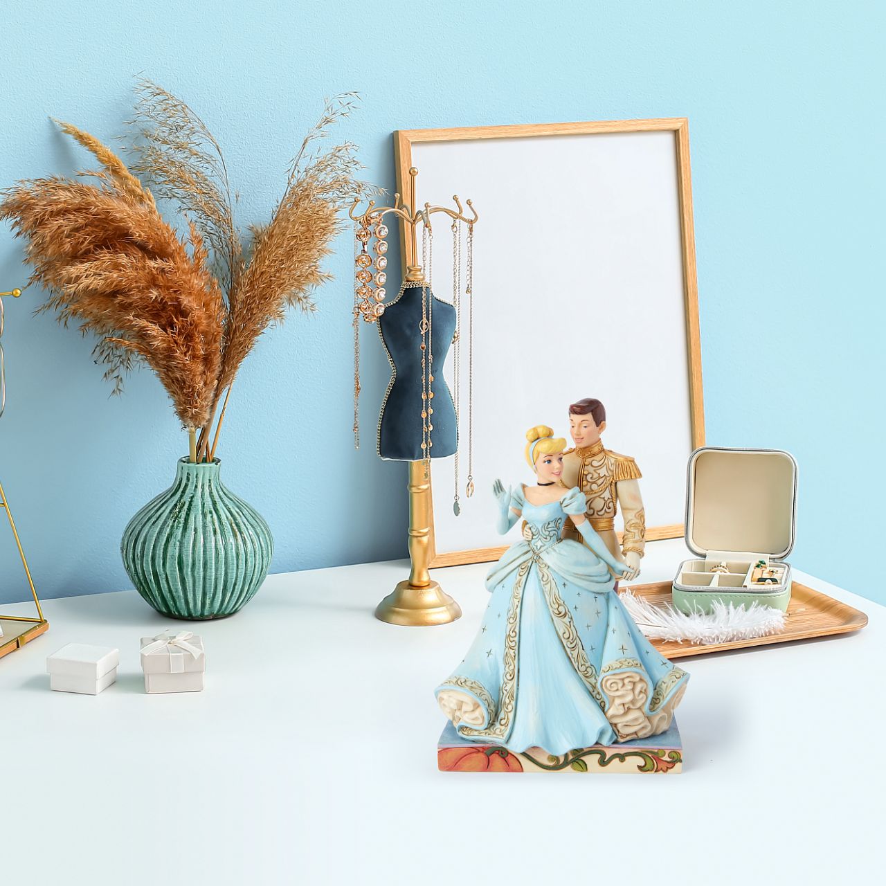 Featuring the iconic Cinderella ahead of her 75th Anniversary in 2025, with her love the Prince. Hand crafted and hand painted. From the Disney Traditions collections.
